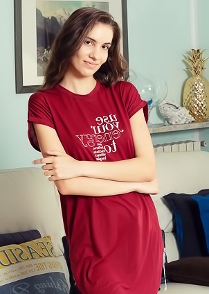 Lili Charmelle Revealing The Intricate Folds Of Her Shaved Pussy With A Smile