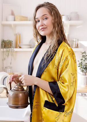 Eliness Exposing The Delicate Pink Folds Of Her Shaved Pussy With A Smile