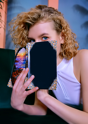 Stacy Ash Curly-haired Cutie Is Daydreaming On The Sofa