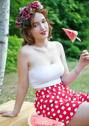 Rokki Parts Her Thighs So Her Scarlet Polka Dot Skirt Rides Up