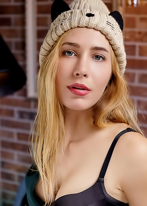 Madelina Unhooks Her Bra And Caresses Her Lovely Breasts Provocatively