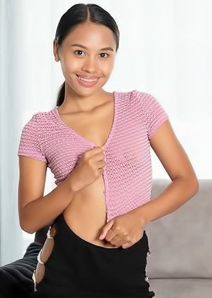 Namy Asian Poses In A Skimpy Outfit That Skims Over Her Slender Figure