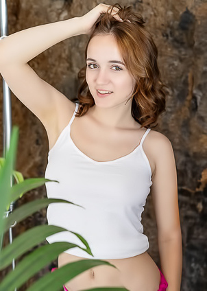 Rokki Her Firm Round Butt Cheeks Glistening Enticingly