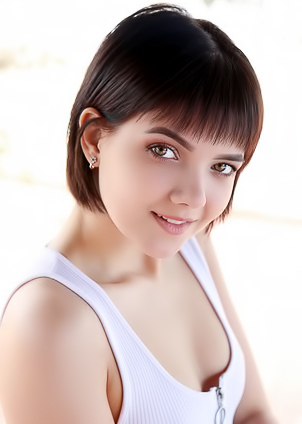 Chanel Fenn In A Tight Bodysuit That Accentuates Her Slender Body And Long Legs