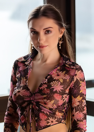 Monika May Sinking Naked Into The Plush Embrace Of An Armchair