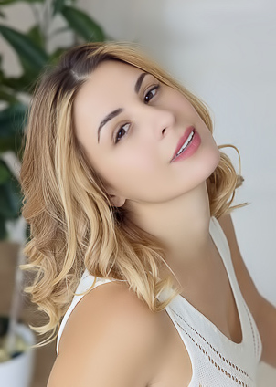 Alice Kelly Dark-eyed Siren Smiles Enticingly As The Straps Slide From Her Shoulders