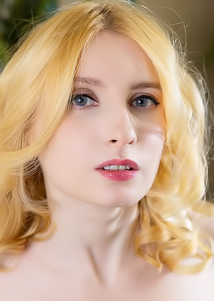 Minnie Lighter Squeezing Her Gorgeous Breasts And Smiles Seductively