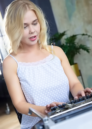 Sarika A Big Boobs Babe And Her Fingers Hovering Over The Keys As If Capturing An Erotic Dream