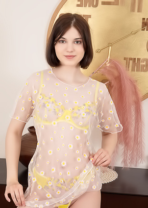 Sara Celeste Bending Over To Show How Her Thong Panties Nestle Between Her Perfect Buns