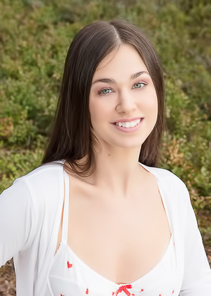 Stella Bloom Seduces In A Forest Clearing As Sunlight Dances On Her Lingerie And Smile