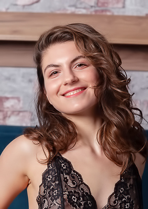 Kassie Lounges In Lingerie Teasingly In Her Bedroom Fantasies