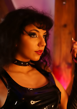 Mitzi X Explores Her Kinky Side In A Dungeon With Masturbation And Dominant Poses