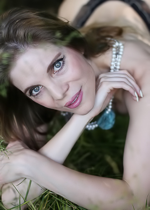 Valentina Love teases with slithers of panties
